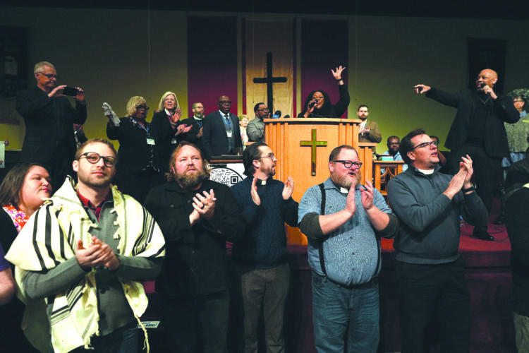 Hundreds pack an Ohio church to back extending protected status for Haitians migrants in the U.S.